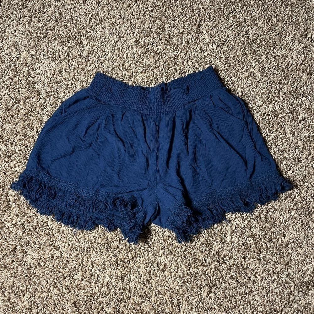 White Crow medium navy blue high rise shorts with pockets.